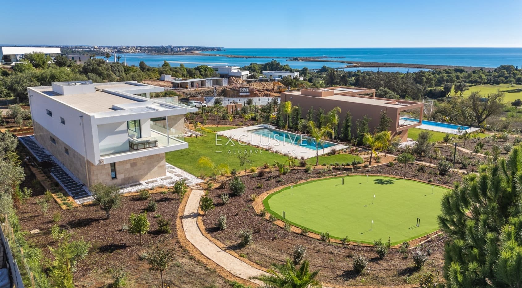 Buy 4 bedroom contemporary villa with golf and ocean views on Palmares golf course Lagos Algarve-1