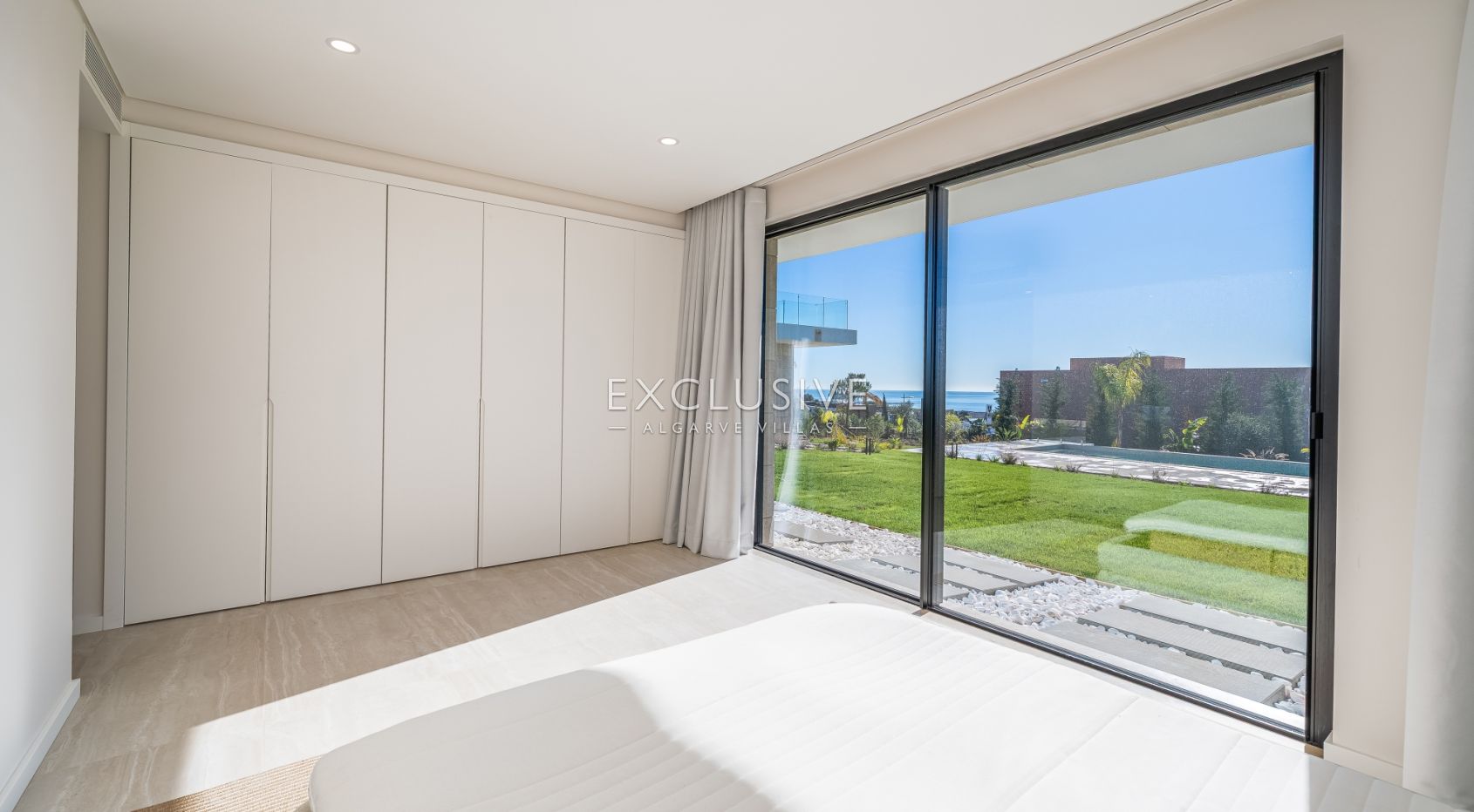Buy 4 bedroom contemporary villa with golf and ocean views on Palmares golf course Lagos Algarve
