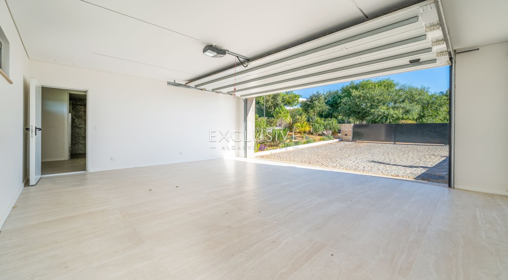 Buy 4 bedroom contemporary villa with golf and ocean views on Palmares golf course Lagos Algarve