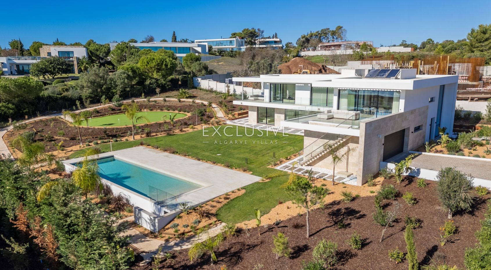 Buy 4 bedroom contemporary villa with golf and ocean views on Palmares golf course Lagos Algarve