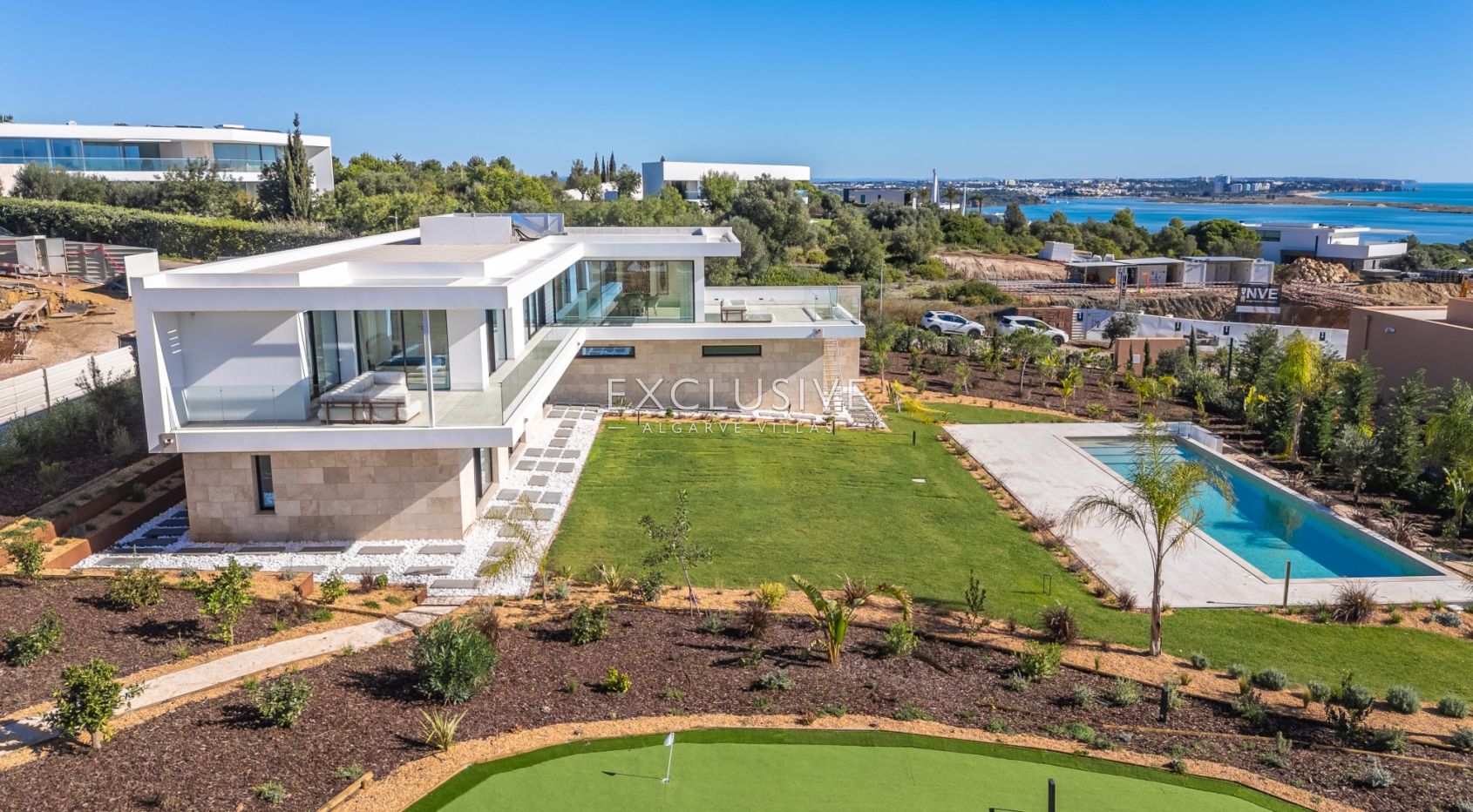 Buy 4 bedroom contemporary villa with golf and ocean views on Palmares golf course Lagos Algarve