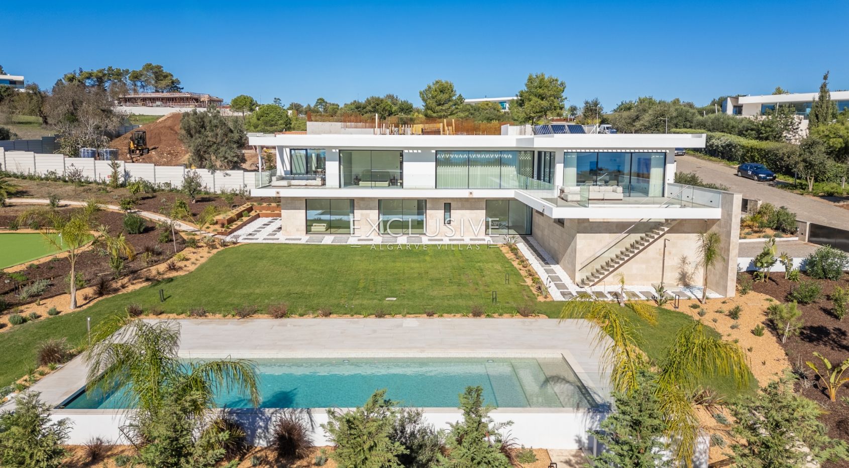 Buy 4 bedroom contemporary villa with golf and ocean views on Palmares golf course Lagos Algarve