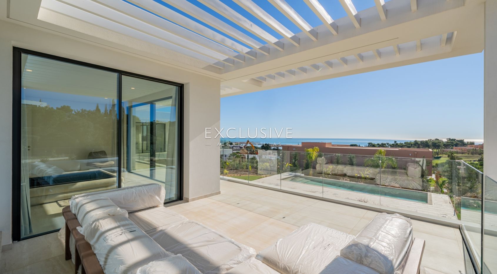 Buy 4 bedroom contemporary villa with golf and ocean views on Palmares golf course Lagos Algarve