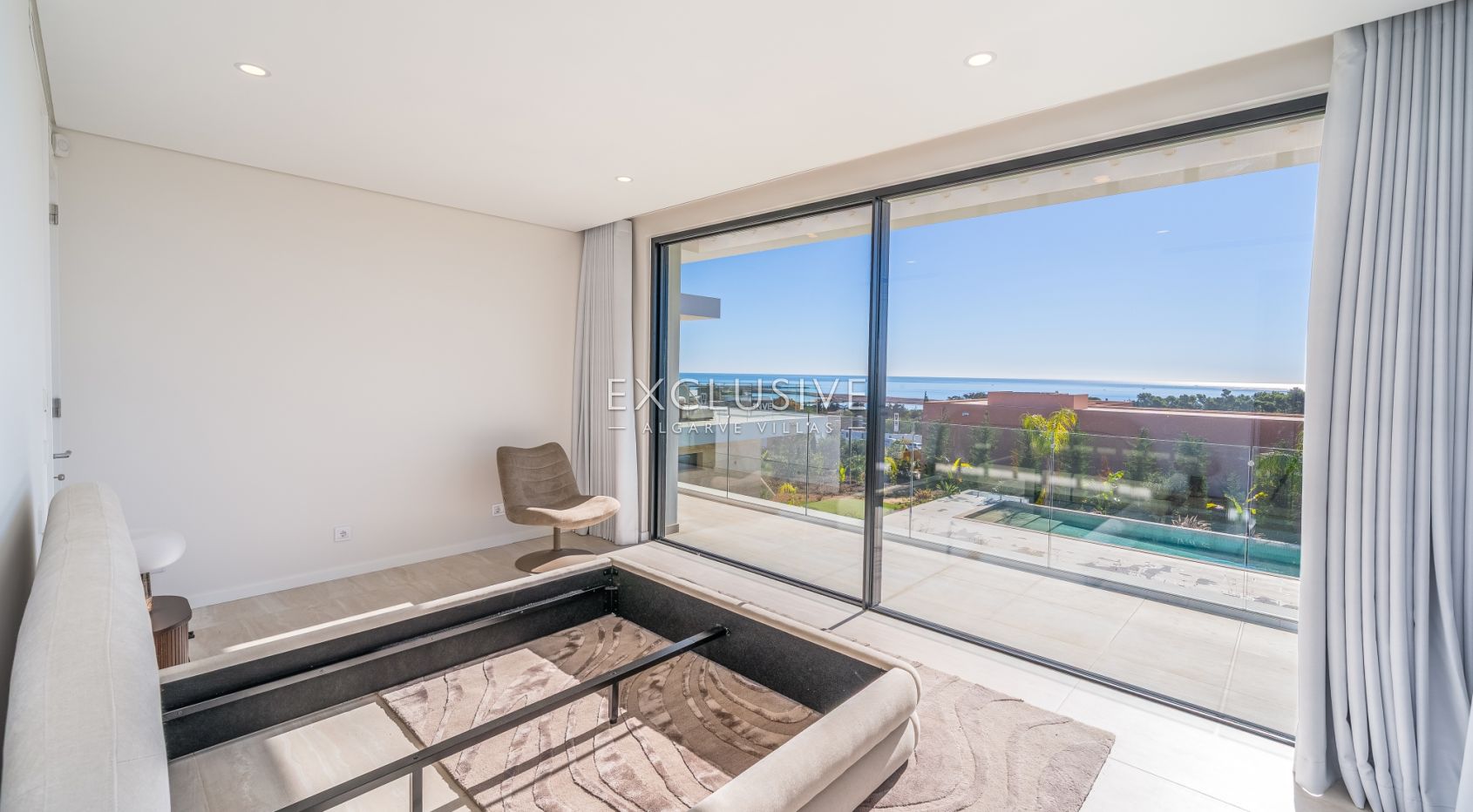 Buy 4 bedroom contemporary villa with golf and ocean views on Palmares golf course Lagos Algarve