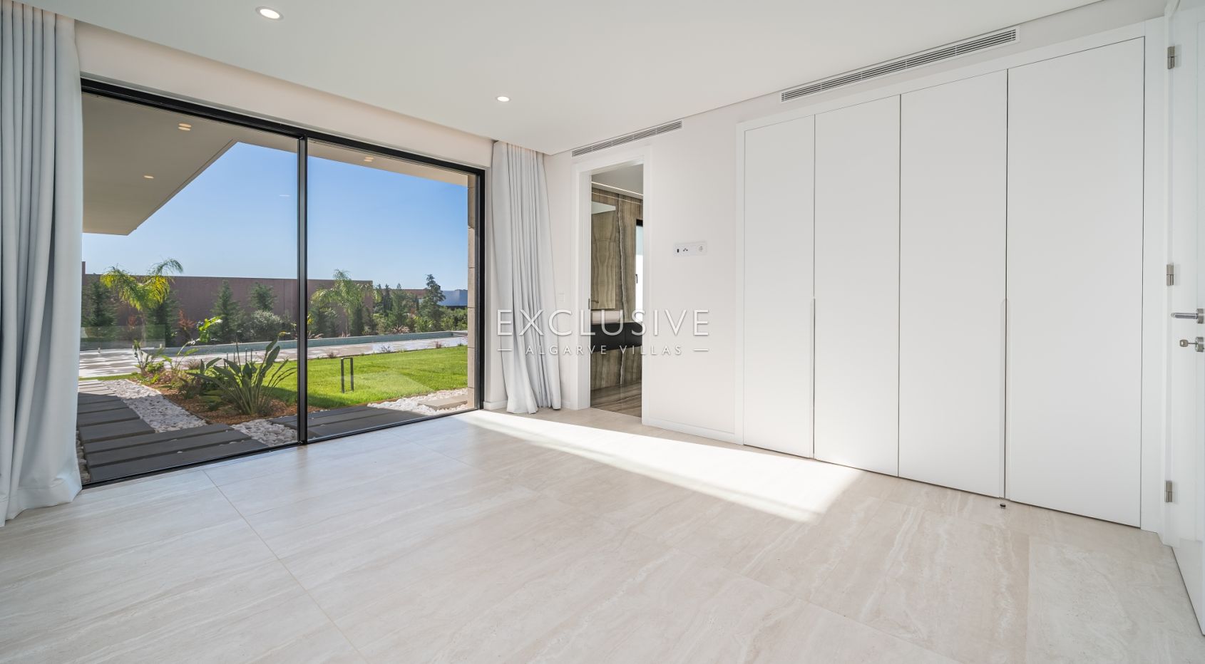 Buy 4 bedroom contemporary villa with golf and ocean views on Palmares golf course Lagos Algarve