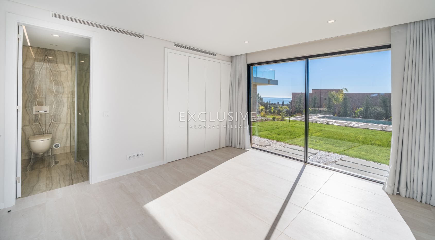 Buy 4 bedroom contemporary villa with golf and ocean views on Palmares golf course Lagos Algarve