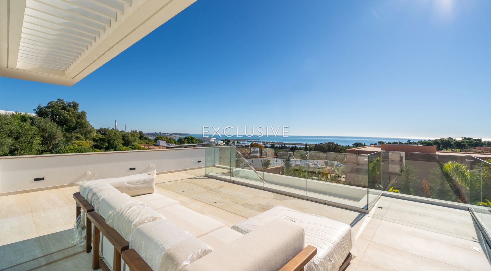 Buy 4 bedroom contemporary villa with golf and ocean views on Palmares golf course Lagos Algarve