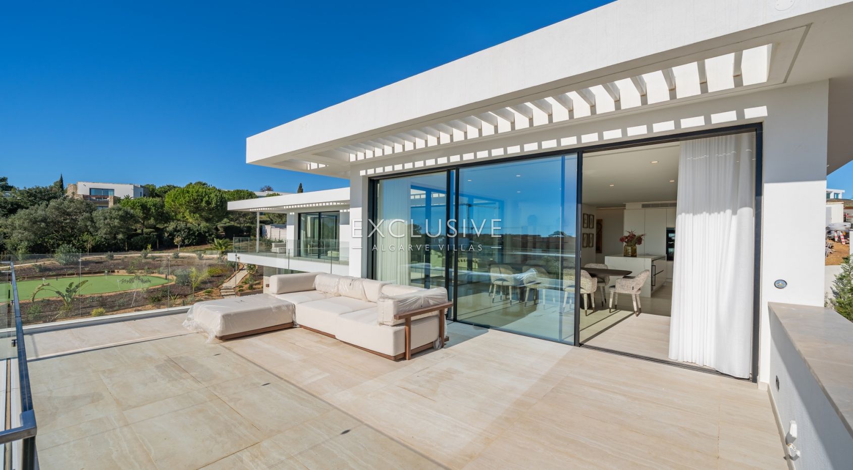 Buy 4 bedroom contemporary villa with golf and ocean views on Palmares golf course Lagos Algarve