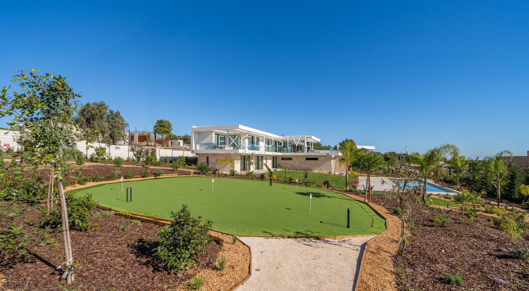 Buy 4 bedroom contemporary villa with golf and ocean views on Palmares golf course Lagos Algarve