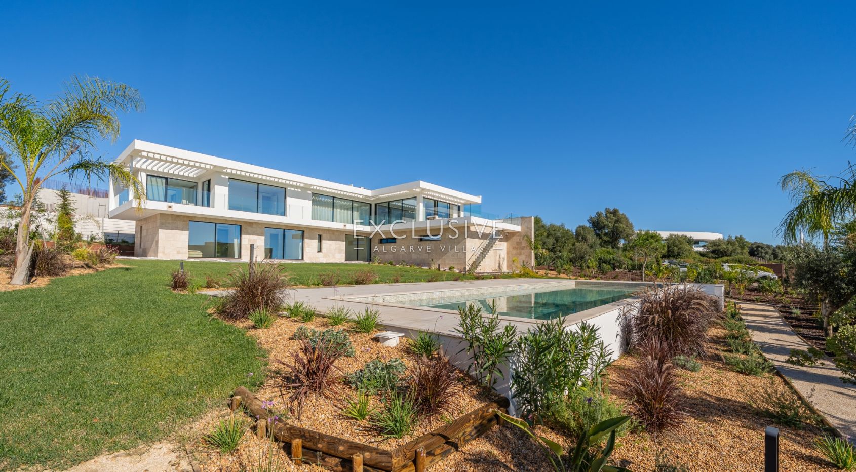 Buy 4 bedroom contemporary villa with golf and ocean views on Palmares golf course Lagos Algarve