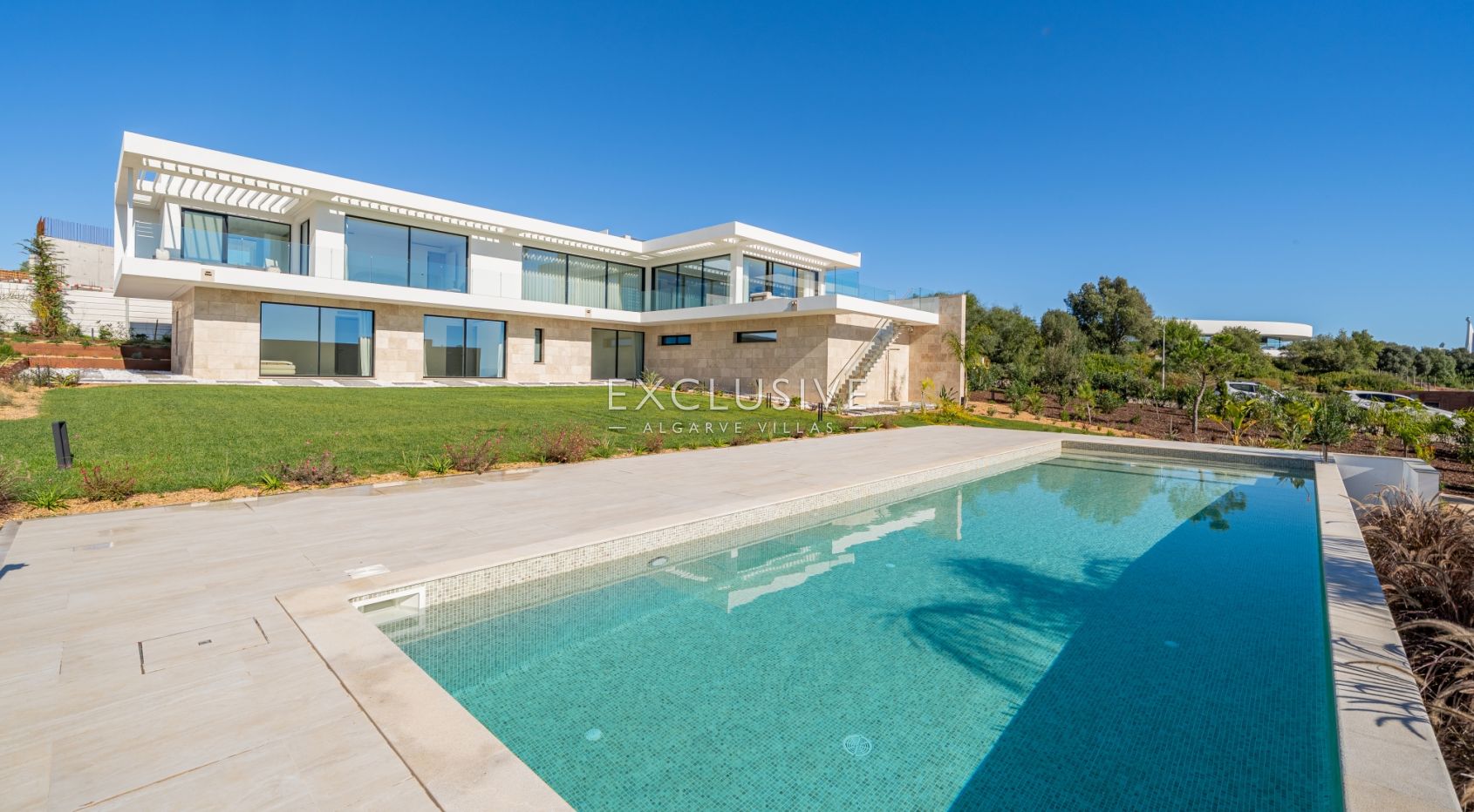 Buy 4 bedroom contemporary villa with golf and ocean views on Palmares golf course Lagos Algarve