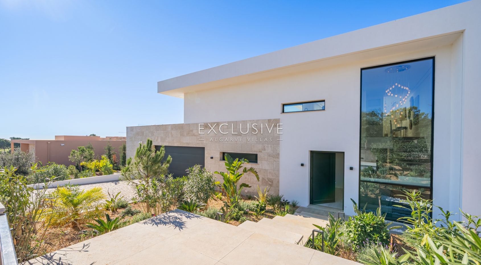 Buy 4 bedroom contemporary villa with golf and ocean views on Palmares golf course Lagos Algarve