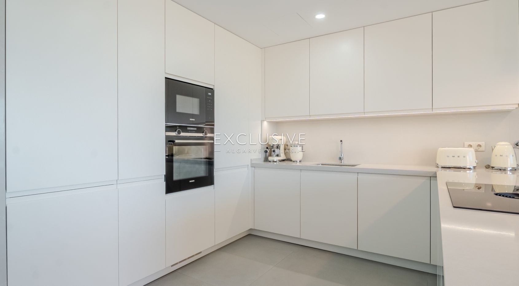 Buy Modern Two Bedroom Apartment in Quarteira Steps from the Sea, Algarve