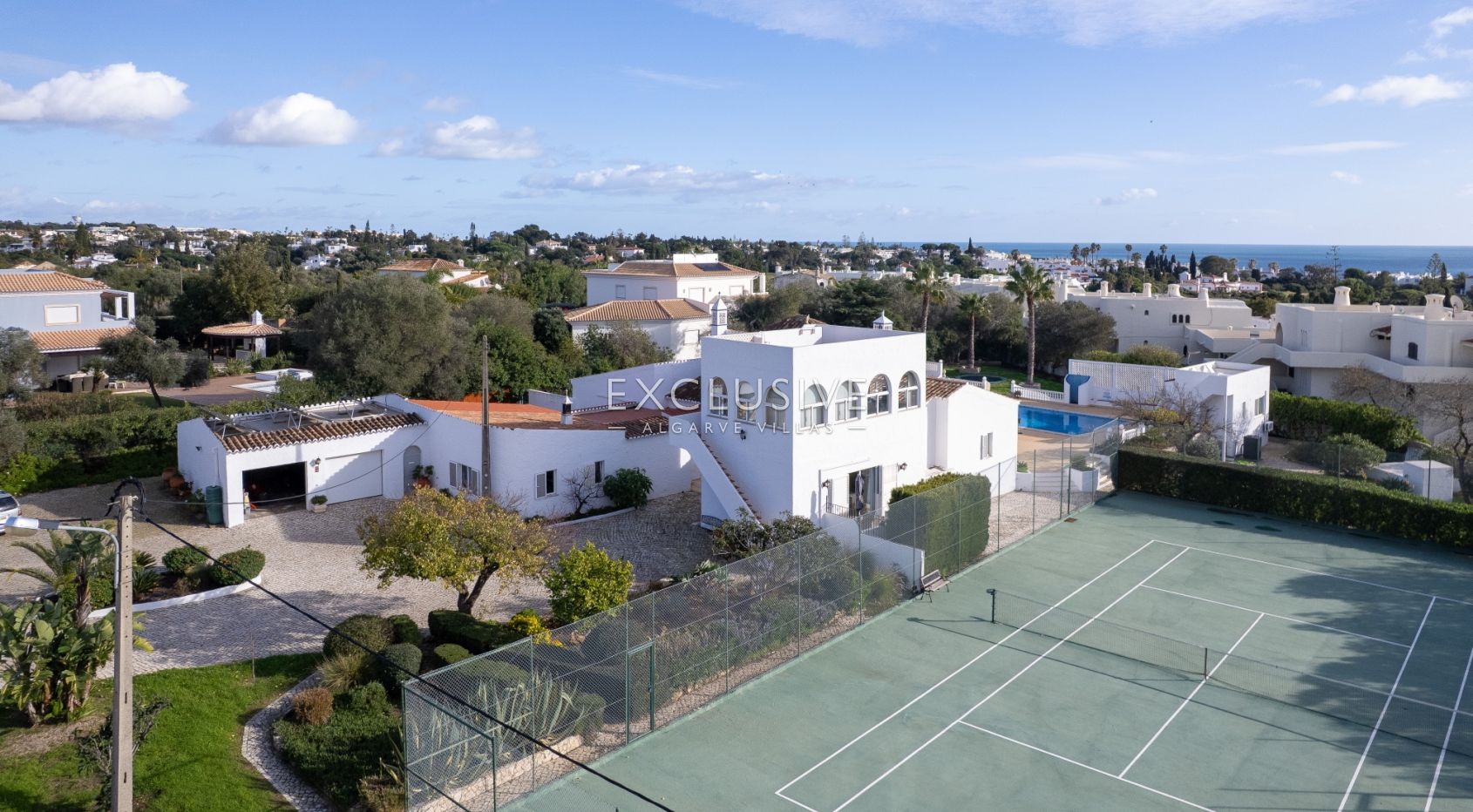 Panoramic Sea-View Villa in Carvoeiro — 6 Bedrooms, Heated Saltwater Pool, Tennis Court & Walk to To