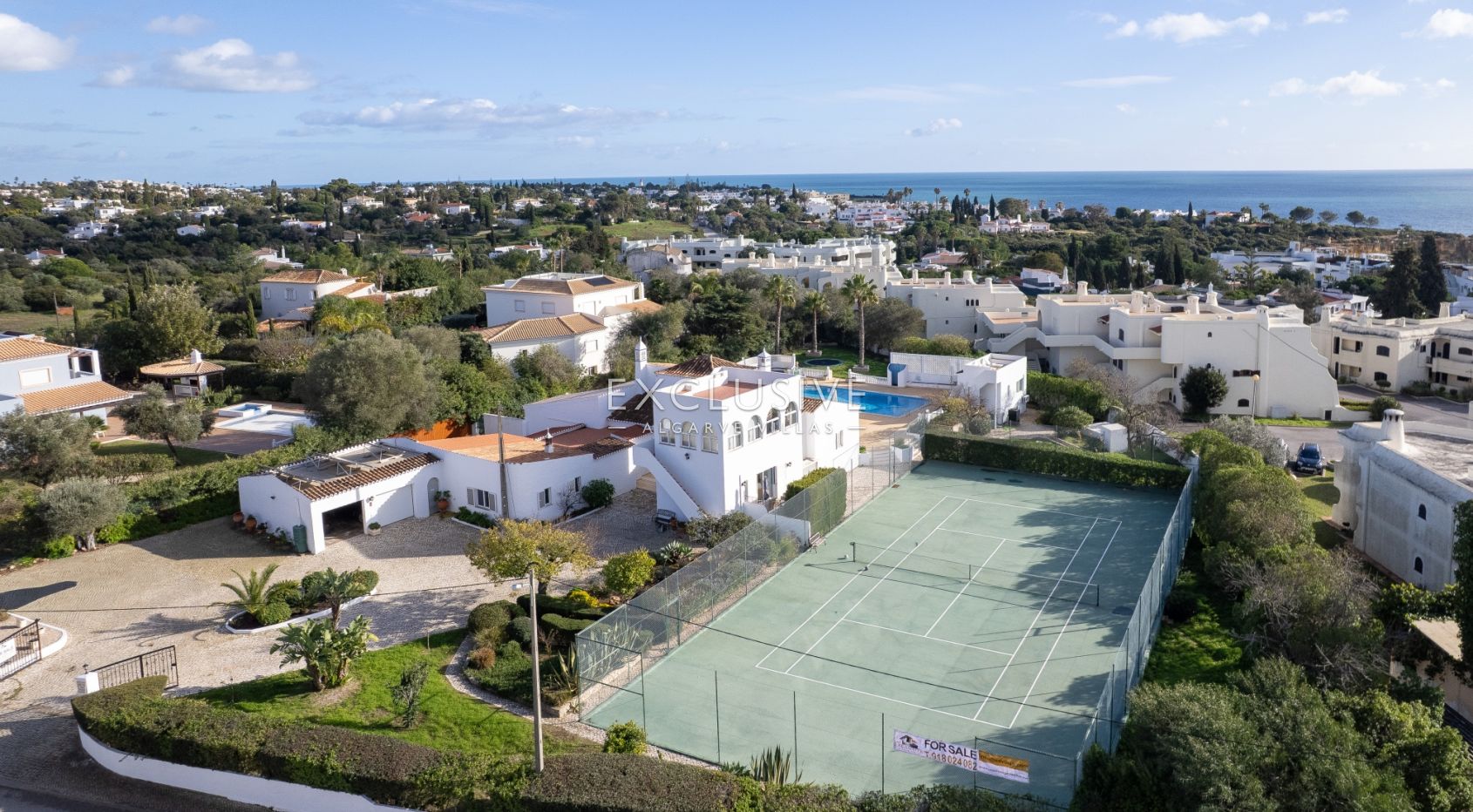 Panoramic Sea-View Villa in Carvoeiro — 6 Bedrooms, Heated Saltwater Pool, Tennis Court & Walk to To