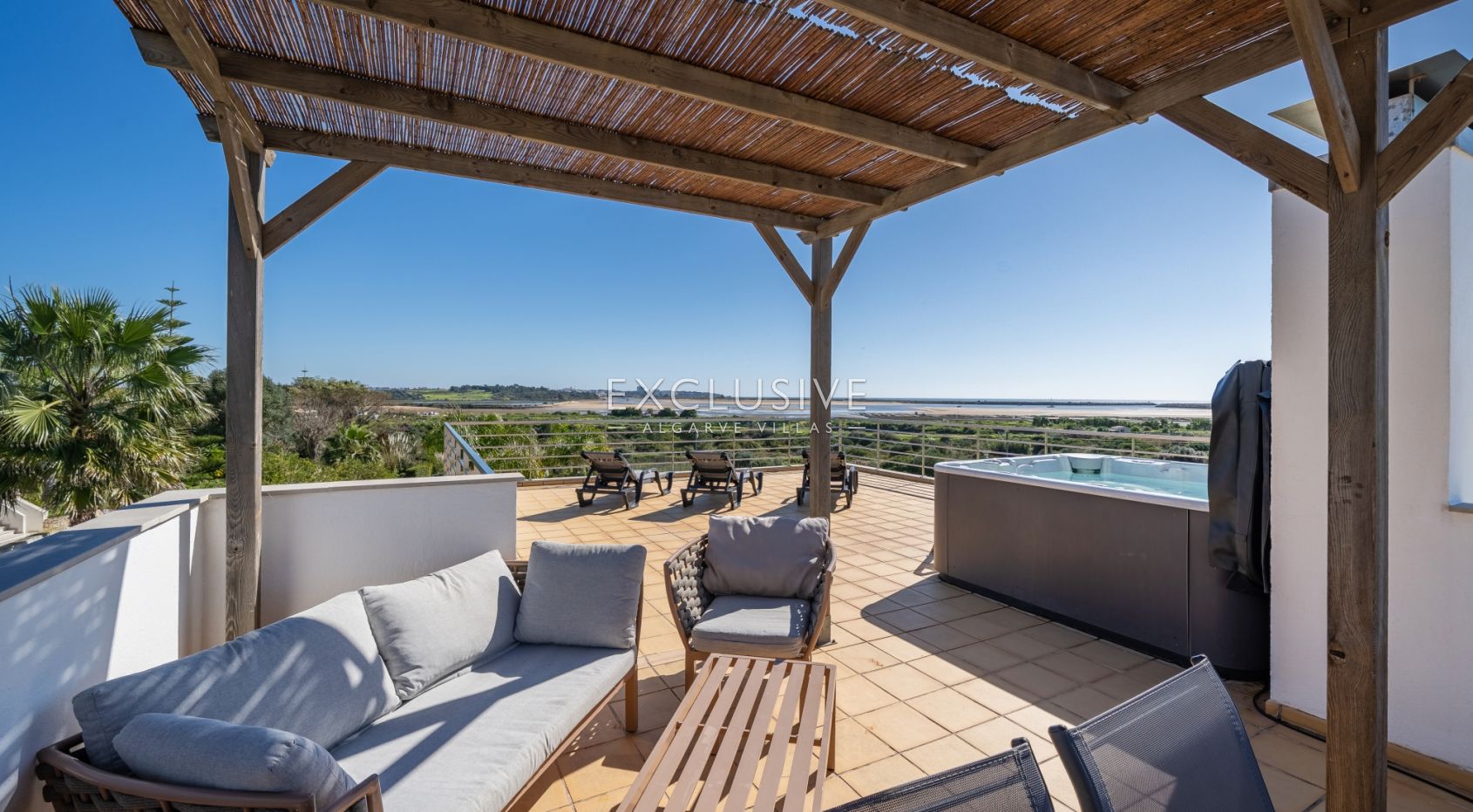 Contemporary villa overlooking Palmares golf course, the Meia Praia and Alvor Estuary