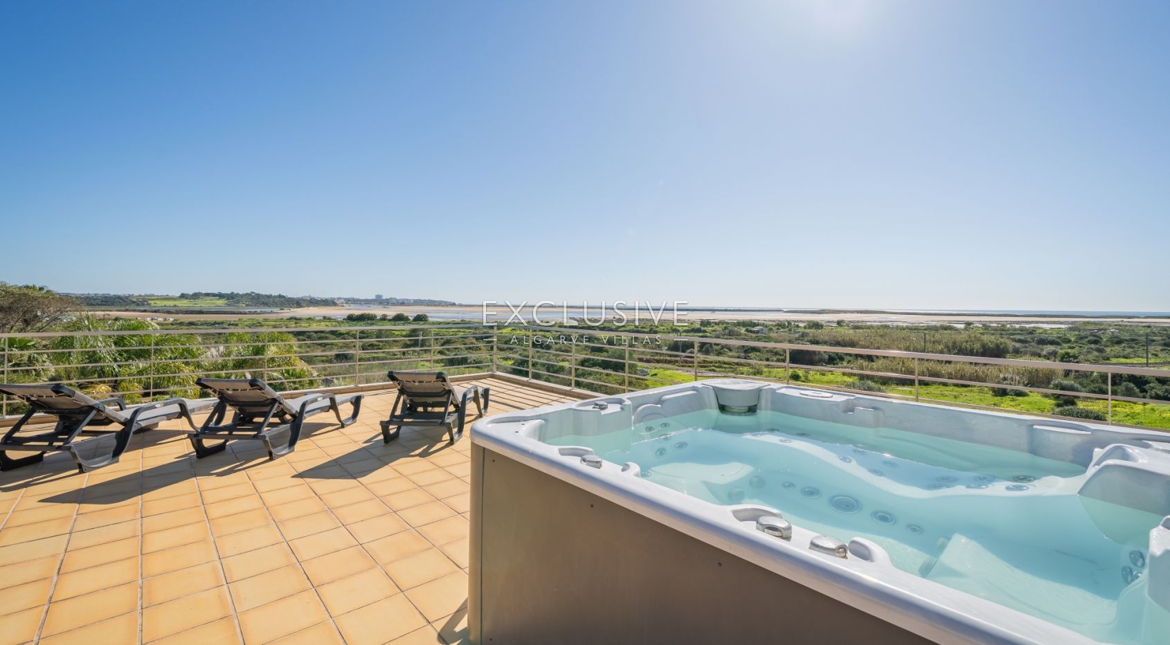 Contemporary villa overlooking Palmares golf course, the Meia Praia and Alvor Estuary