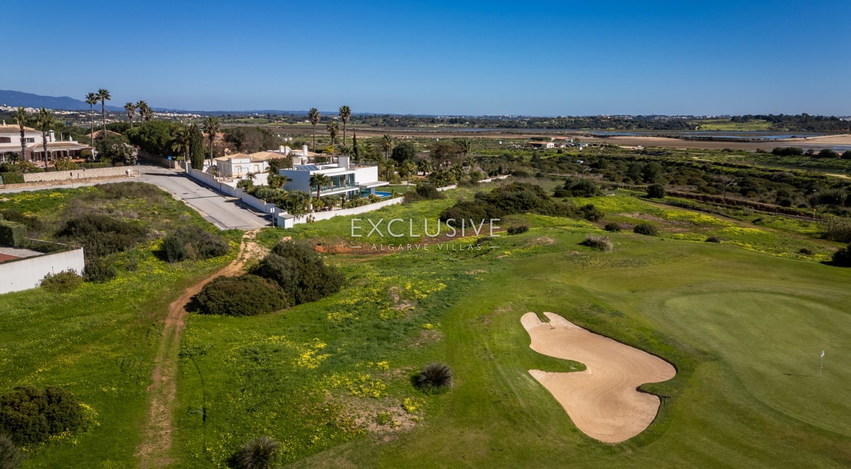 Contemporary villa overlooking Palmares golf course, the Meia Praia and Alvor Estuary
