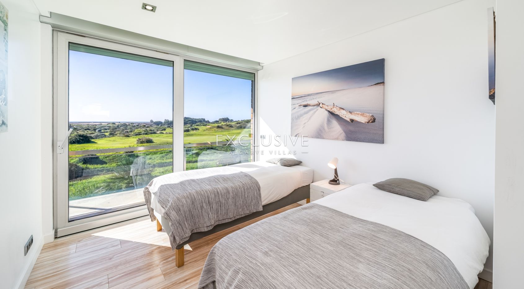 Contemporary villa overlooking Palmares golf course, the Meia Praia and Alvor Estuary